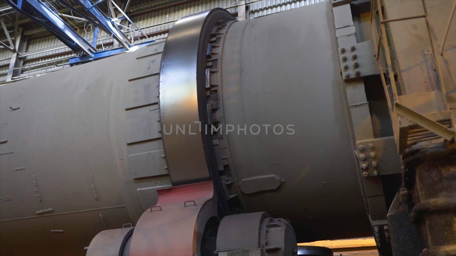 Rotating tank at factory. Stock footage. Huge rotating tank at metallurgical factory. Huge installations with turbines and tanks in heavy industry.