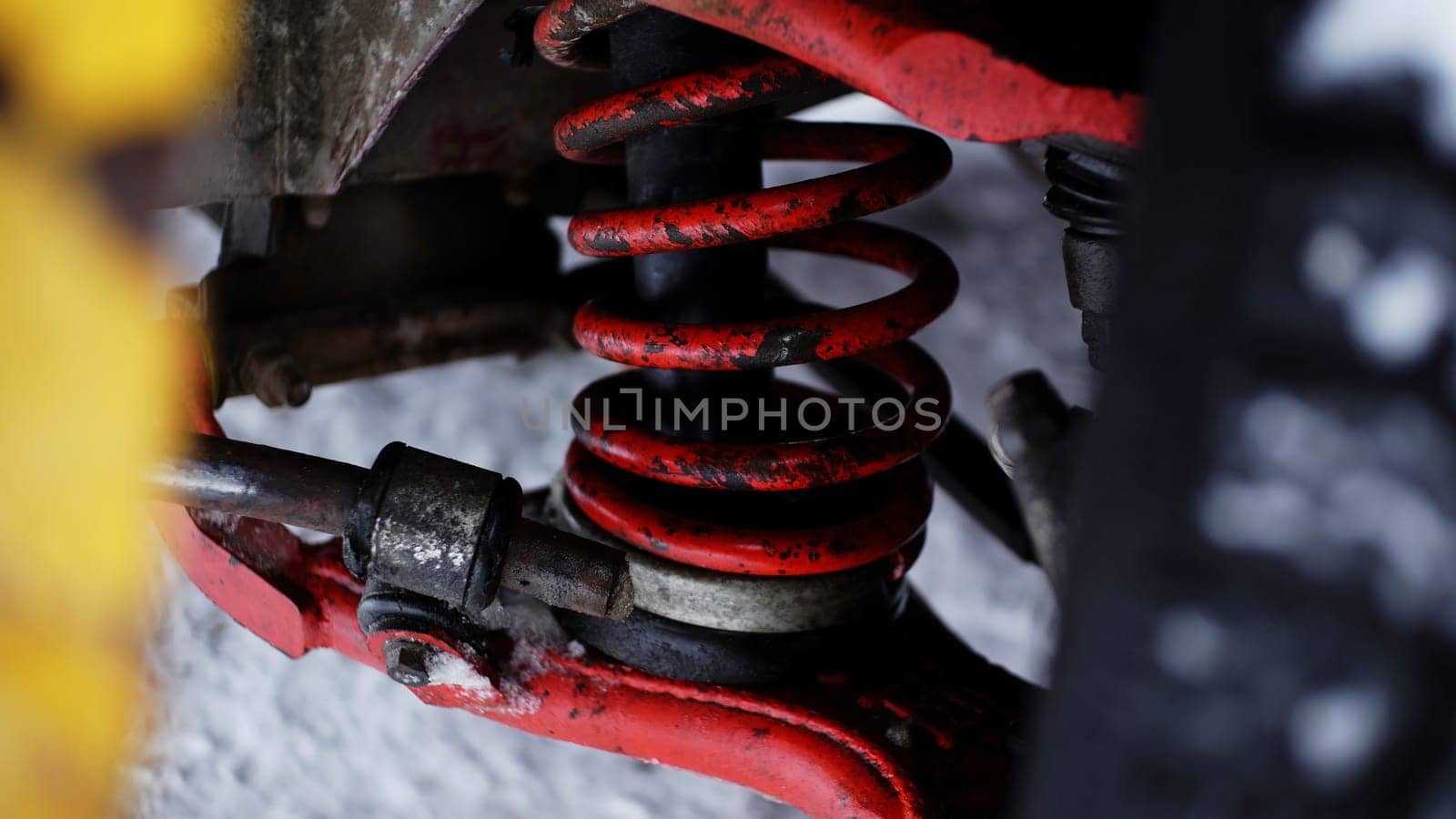 The spring is in the car. Clip. A snowy landscape with a spare part in a car that is being filmed in close-up. High quality 4k footage