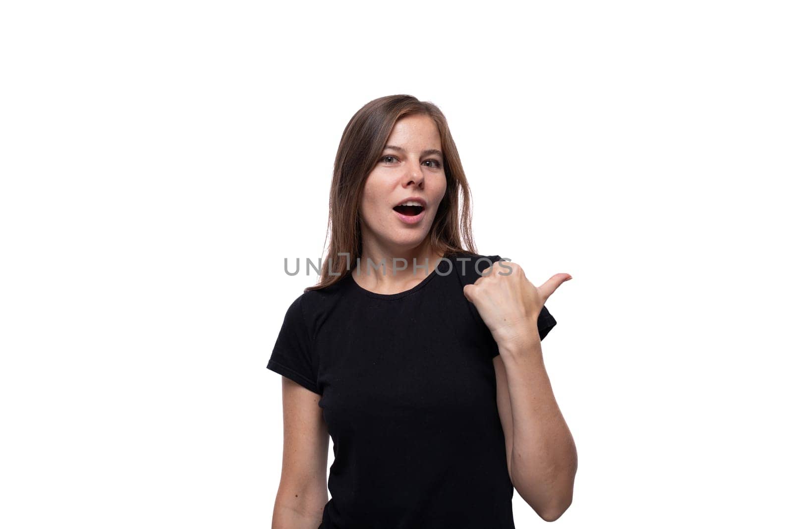 Portrait of a young woman dressed in basic clothing with a mockup for print by TRMK