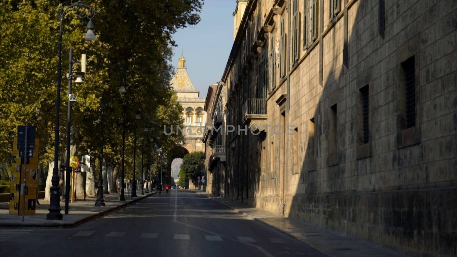 Beautiful European street with country architecture sunny day. Action. Summer vacation abroad in historic city with beautiful architecture.