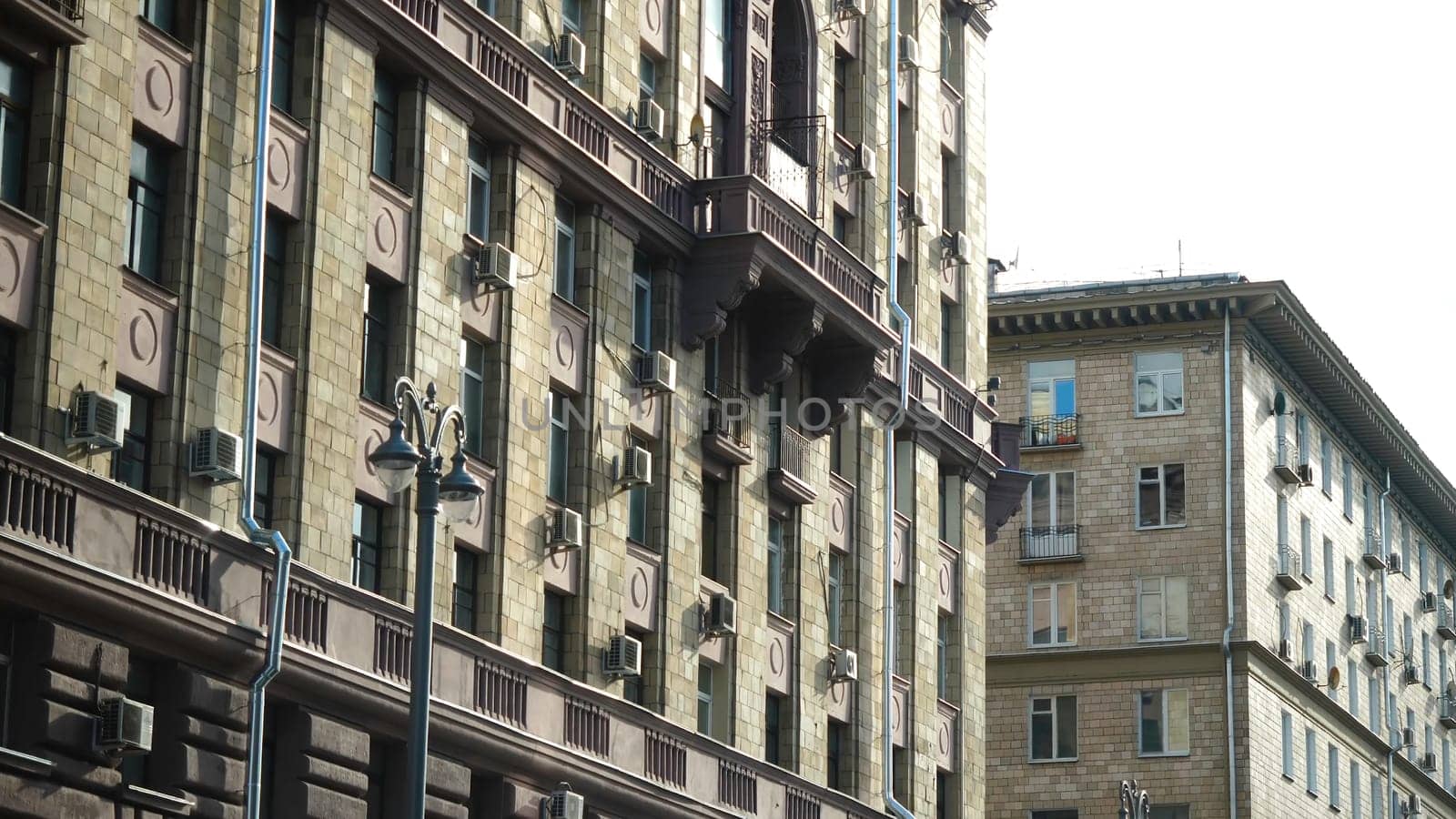 Historical building in the city. City shows their old culture. Old historical building in the centre of the city, the view from the car.