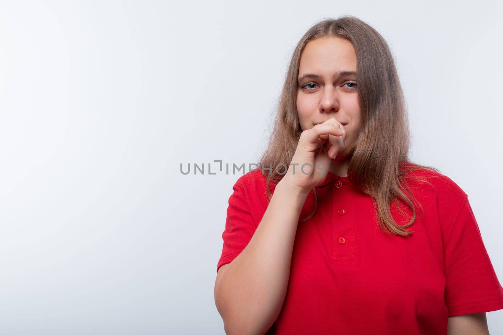 Caucasian girl with brown hair is wearing a red T-shirt by TRMK