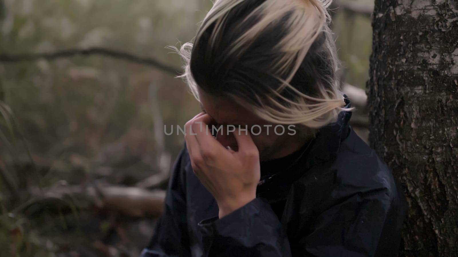 Young people walking. Stock. A young handsome man and a woman walking on the street in not very clear weather and taking portrait shots. High quality 4k footage