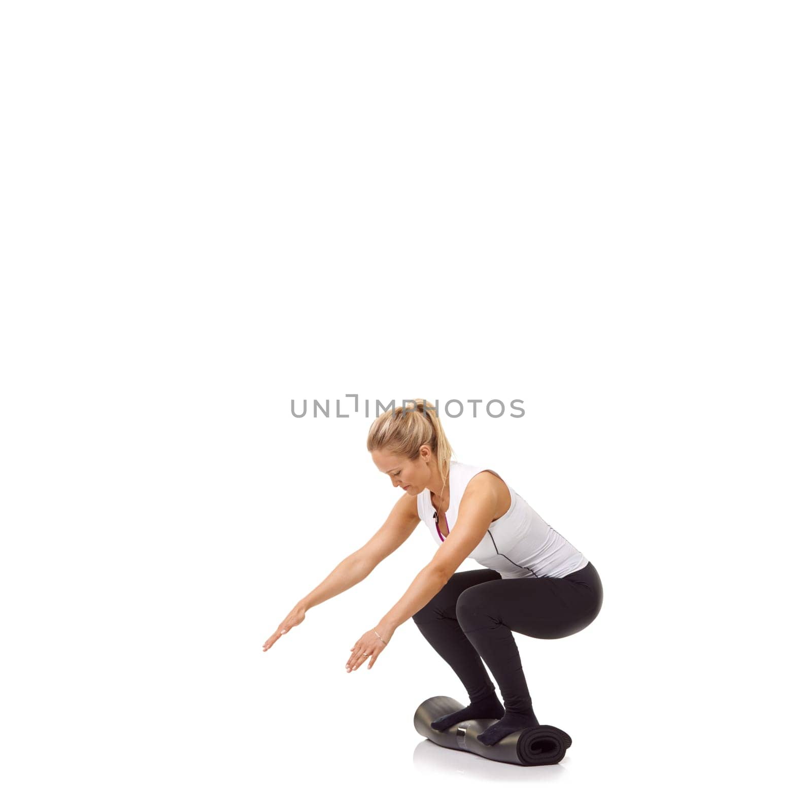 Woman, squat and workout on mat, studio profile or mockup space for legs, fitness or health by white background. Girl, yoga or pilates with training, thinking and muscle development process on floor.