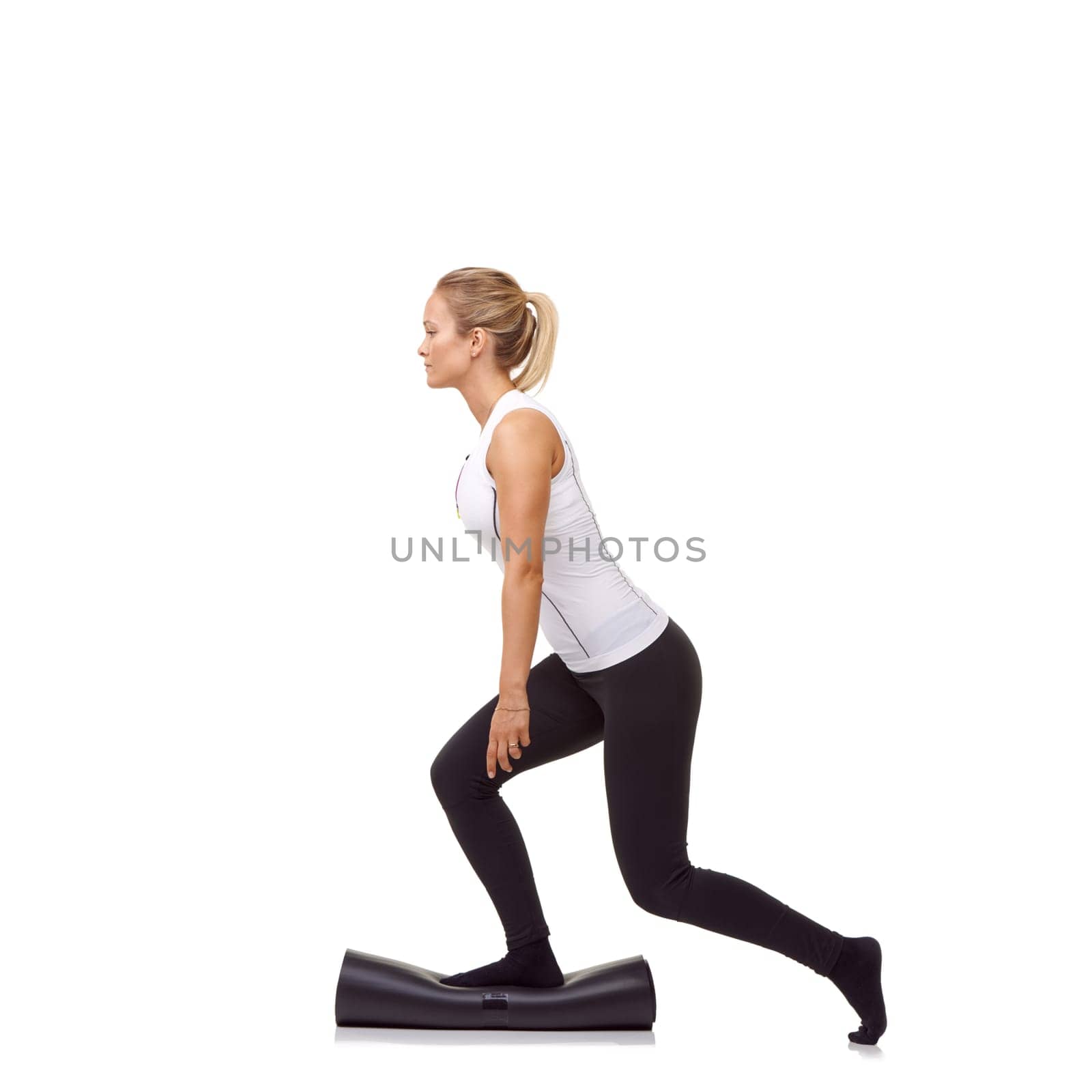 Woman, lunge and workout on mat, studio profile or stretching for fitness, health or balance by white background. Girl, yoga or pilates with training, thinking or muscle development for legs on floor.