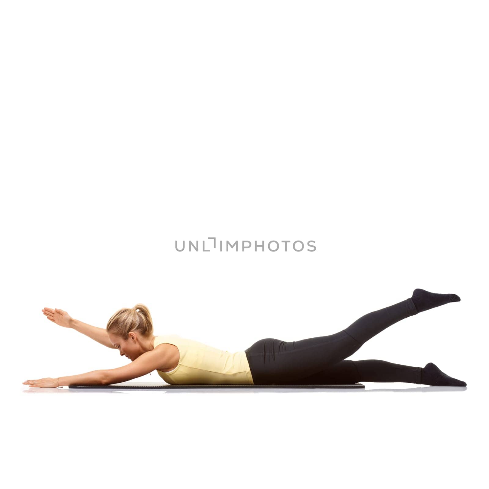 Woman, fitness and mat in studio for stretching, pilates or workout for healthy body, wellness or core muscle. Person, exercise or yoga on floor for abdomen health on mockup space or white background by YuriArcurs