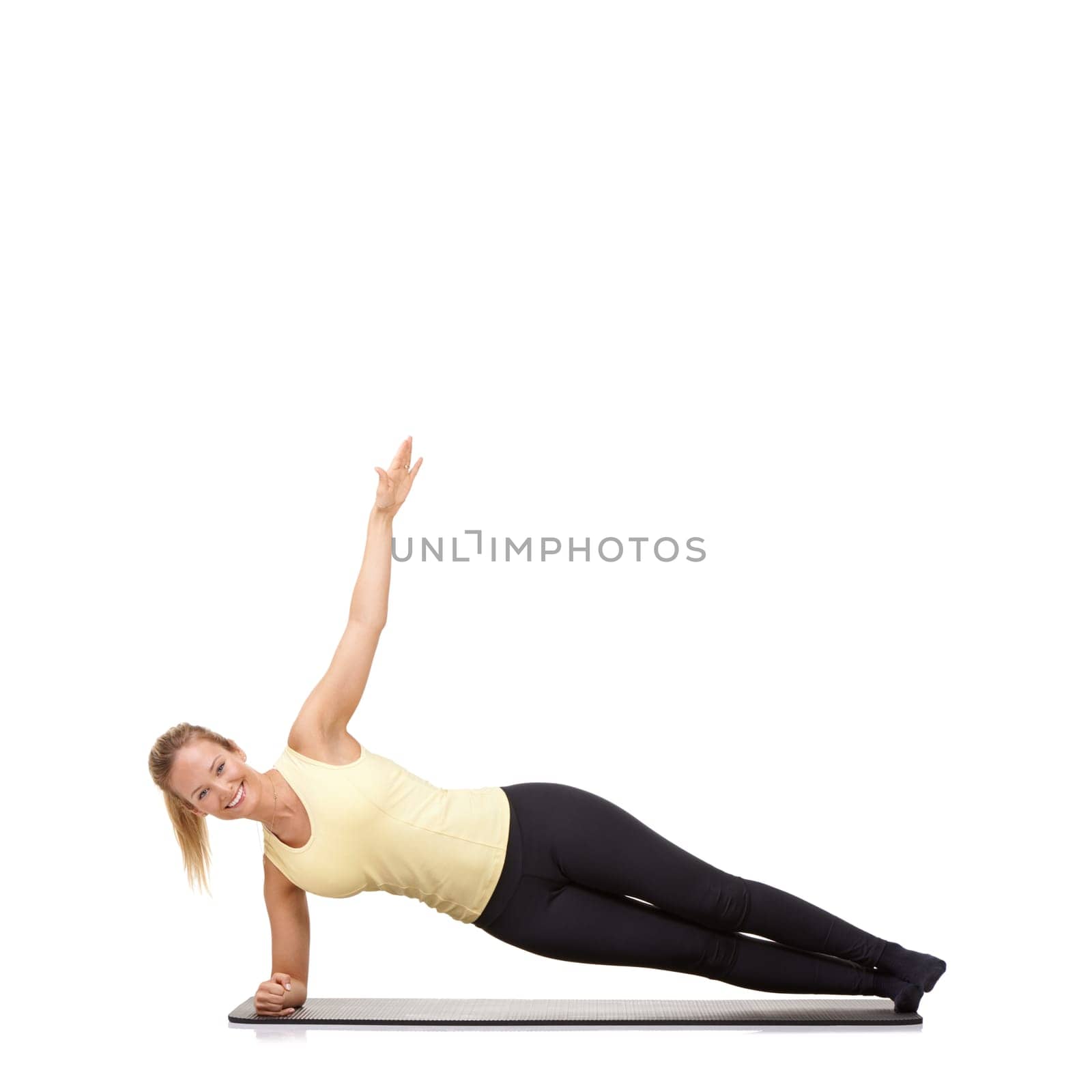 Woman, yoga and mat in studio for stretching, fitness or workout for healthy body, smile and core muscle. Person, portrait and pilates on floor for abdomen health on mockup space or white background by YuriArcurs