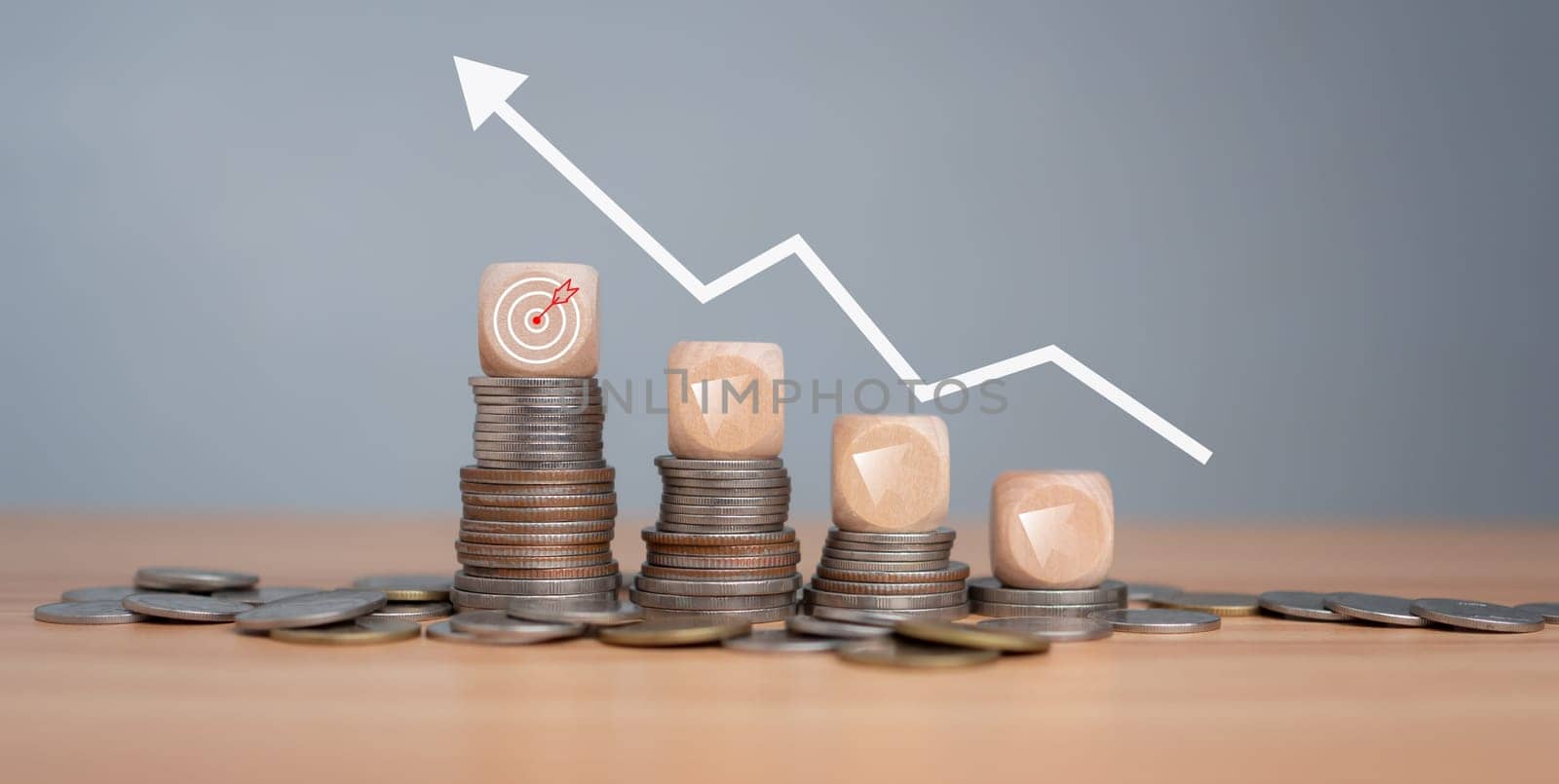 Inflation concept, white graph arrow, world economics, and inflation control, Money and budget management, dart board on a wooden cube with row of coins in idea for FED consider interest rate hike. by Unimages2527