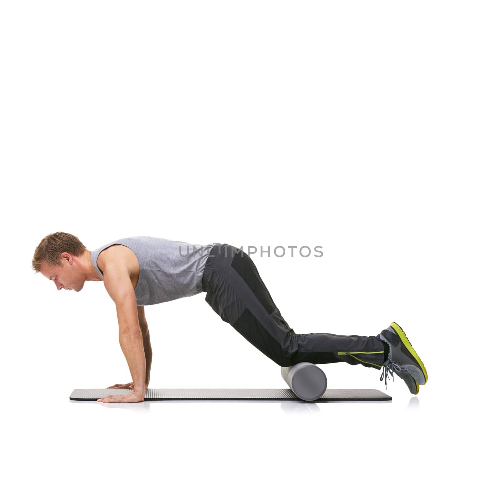 Arm exercise, foam roller and man in push up for strength training, muscle endurance or pilates rehabilitation workout on ground. Yoga mat, mockup studio space or active person on white background.