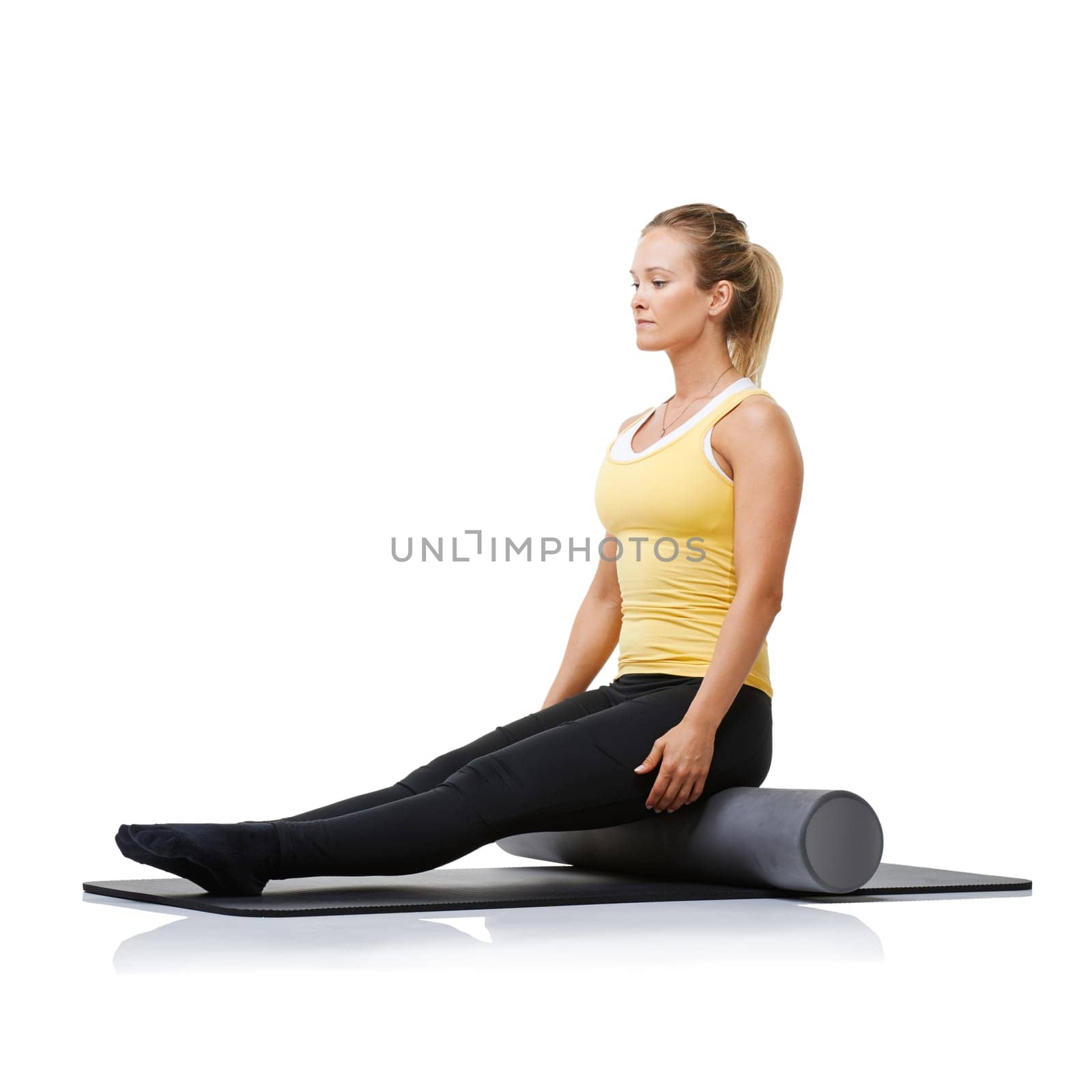 Studio workout, foam roller and woman with posture exercise, spine rehabilitation or yoga performance challenge. Floor, body wellness training and person sit on fitness equipment on white background.