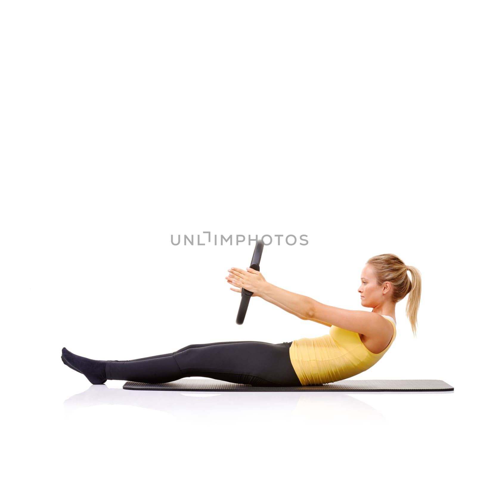 Woman, pilates ring and balance on yoga mat for resistance stretching or health, roll up or studio white background. Female person, arms equipment for muscle flexibility, wellness strength or mockup.