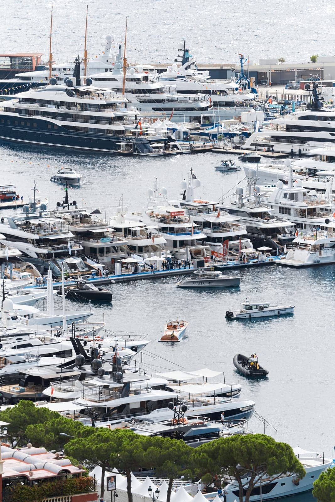 Monaco, Monte Carlo, 27 September 2022 - a lot of luxury yachts at the famous motorboat exhibition in the principality, the most expensive boats for the richest people around the world, yacht brokers. High quality photo