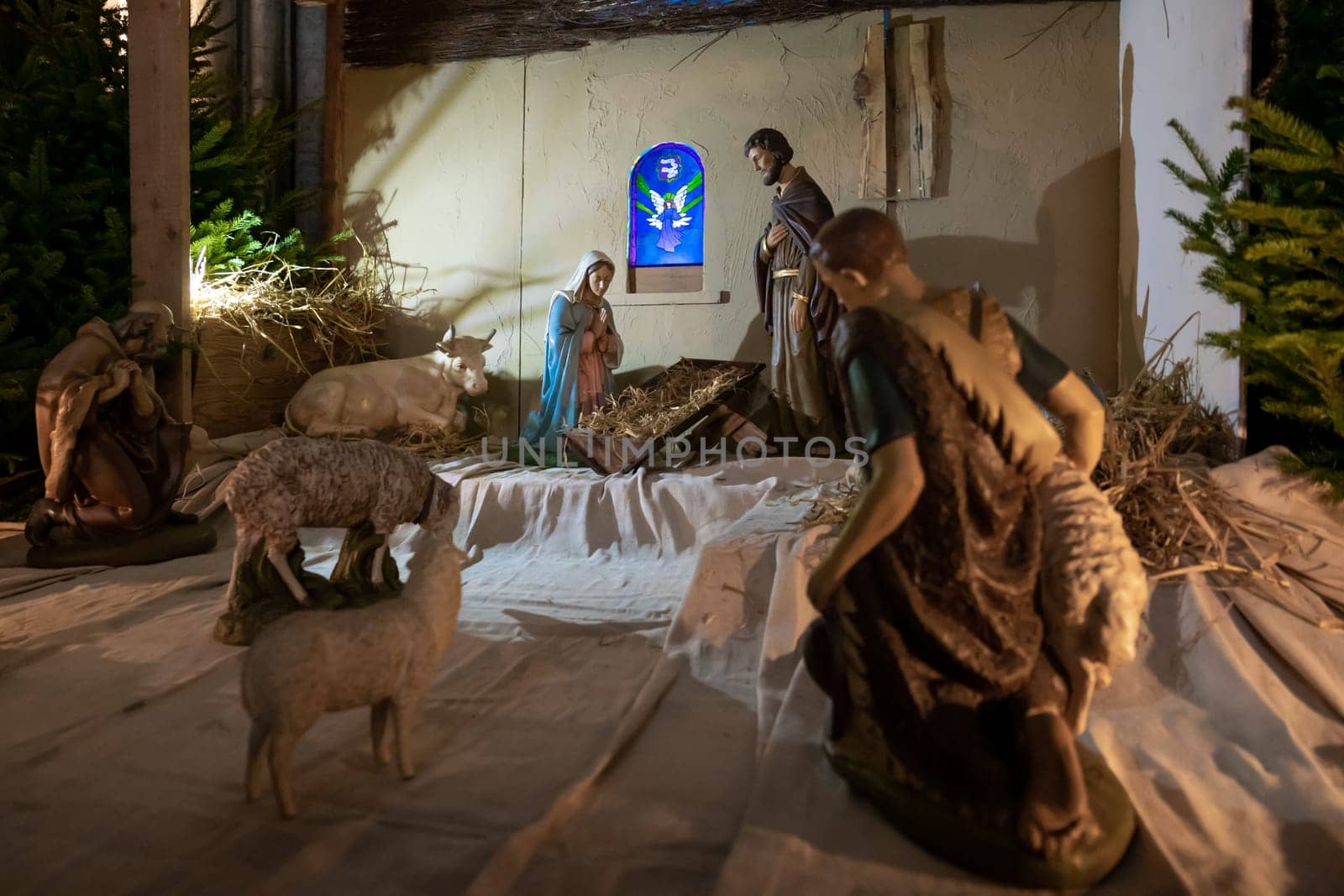 Christmas nativity scene without baby Jesus in the church