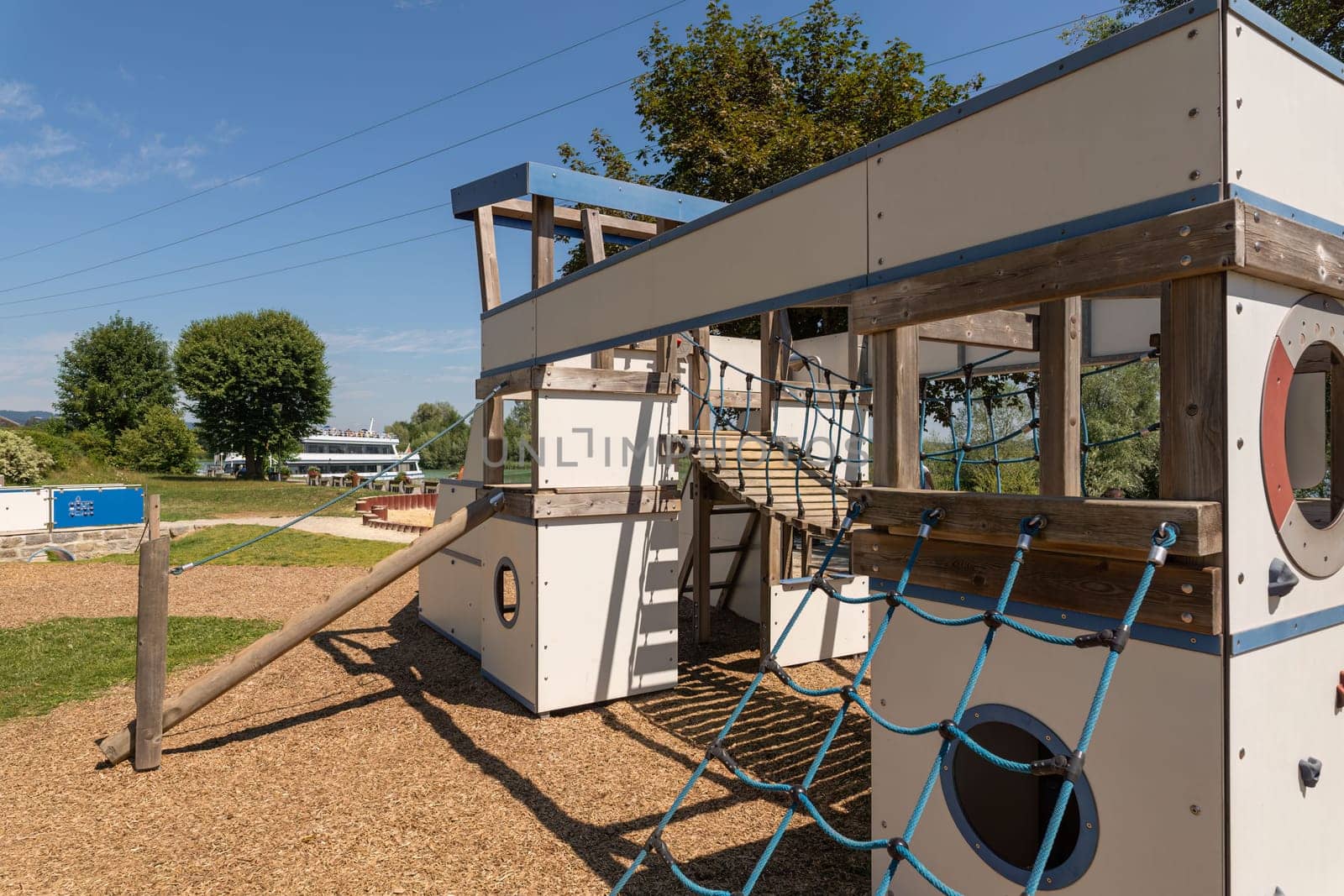 Empty Playboat Structure in Sunny Playground Setting by AllesSuper