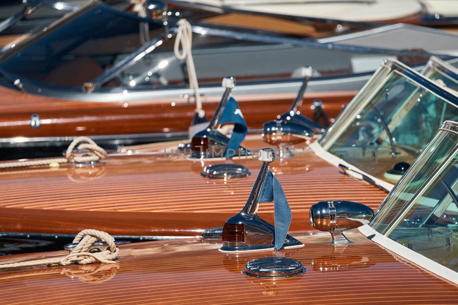 Few luxury retro motor boats in row at the famous motorboat exhibition in the principality of Monaco, Monte Carlo, the most expensive boats for the richest people, boats for rich clients. High quality photo