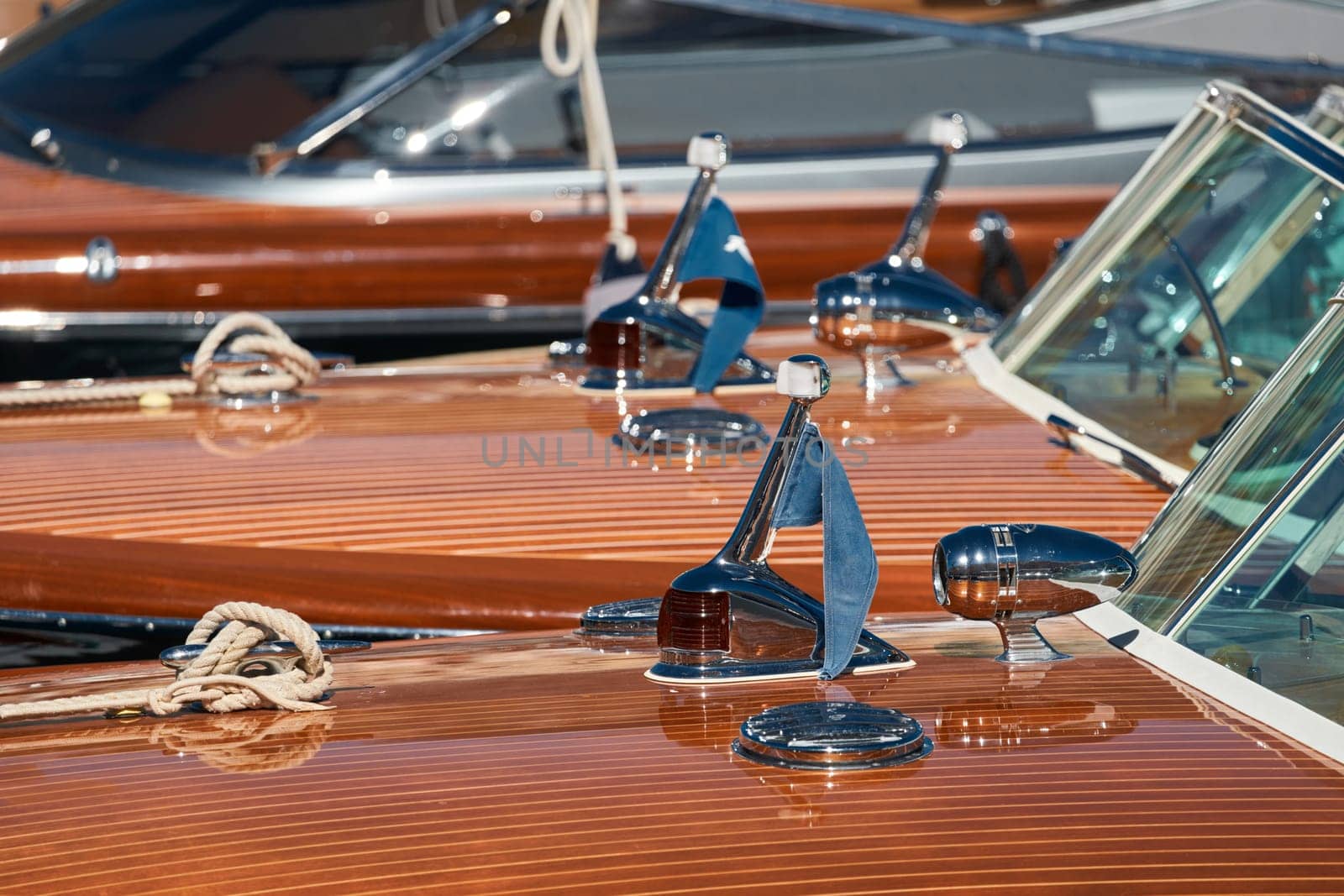 Few luxury retro motor boats in row at the famous motorboat exhibition in the principality of Monaco, Monte Carlo, the most expensive boats for the richest people, boats for rich clients. High quality photo