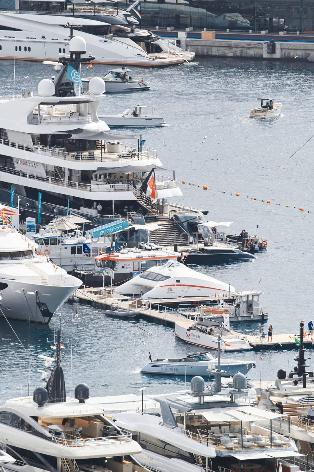 Monaco, Monte Carlo, 28 September 2022 - a lot of luxury yachts at the famous motorboat exhibition in the principality, the most expensive boats for the richest people around the world, yacht brokers. High quality photo