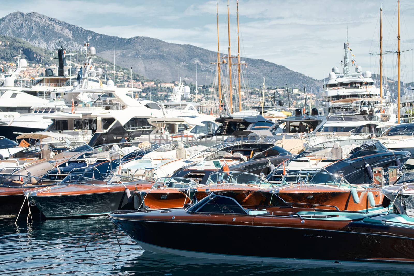 Monaco, Monte Carlo, 28 September 2022 - a lot of luxury yachts at the famous motorboat exhibition in the principality, the most expensive boats for the richest people around the world, yacht brokers. High quality photo