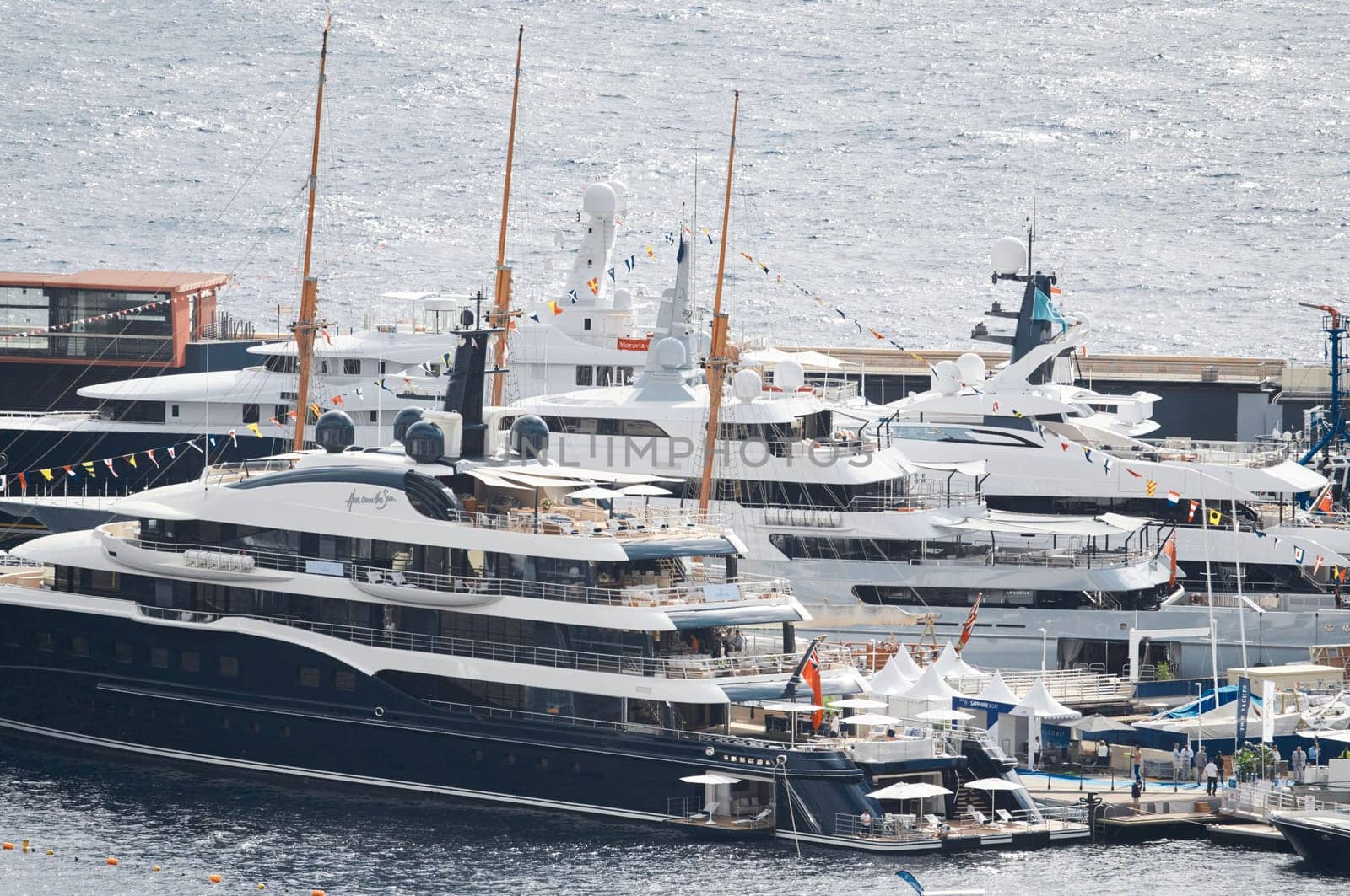 Monaco, Monte Carlo, 28 September 2022 - a lot of luxury yachts at the famous motorboat exhibition in the principality, the most expensive boats for the richest people around the world, yacht brokers. High quality photo