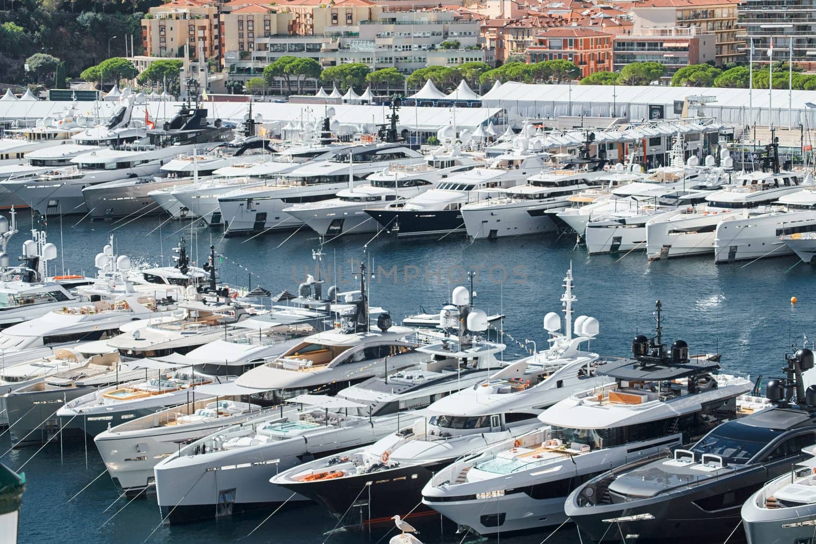 Monaco, Monte Carlo, 28 September 2022 - a lot of luxury yachts at the famous motorboat exhibition in the principality, the most expensive boats for the richest people around the world, yacht brokers. High quality photo