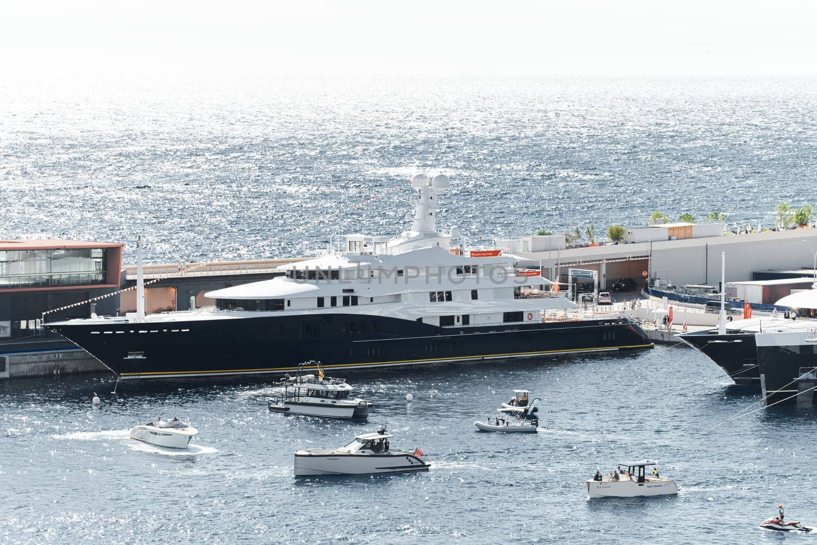 Monaco, Monte Carlo, 28 September 2022 - a lot of luxury yachts at the famous motorboat exhibition in the principality, the most expensive boats for the richest people around the world, yacht brokers. High quality photo