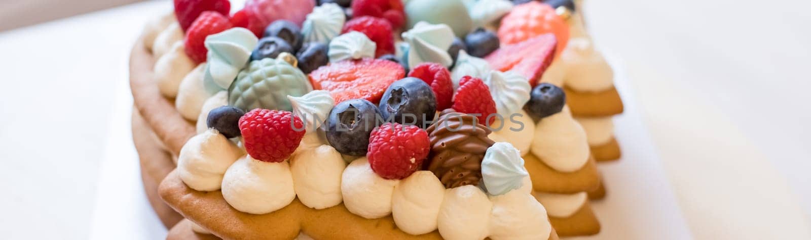 Traditional Christmas cottage cheese cupcakes. Decorated with fir branches and Christmas decorations. Copy space. High key