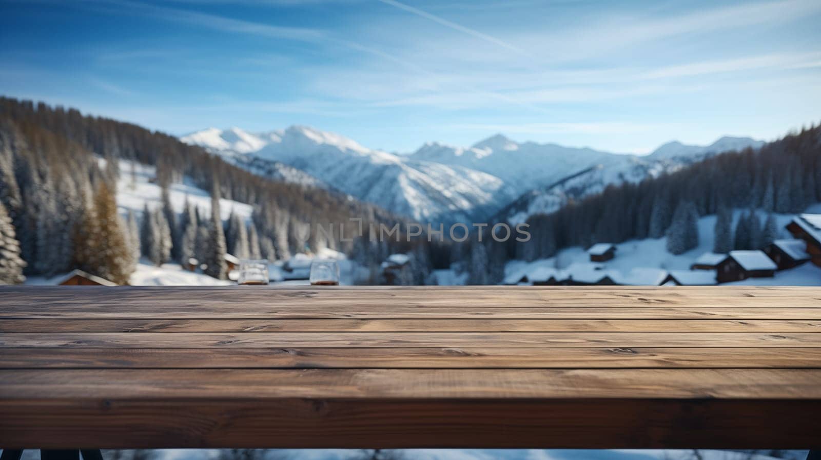 wooden table top, with a wonderful view of the snow-capped mountains.