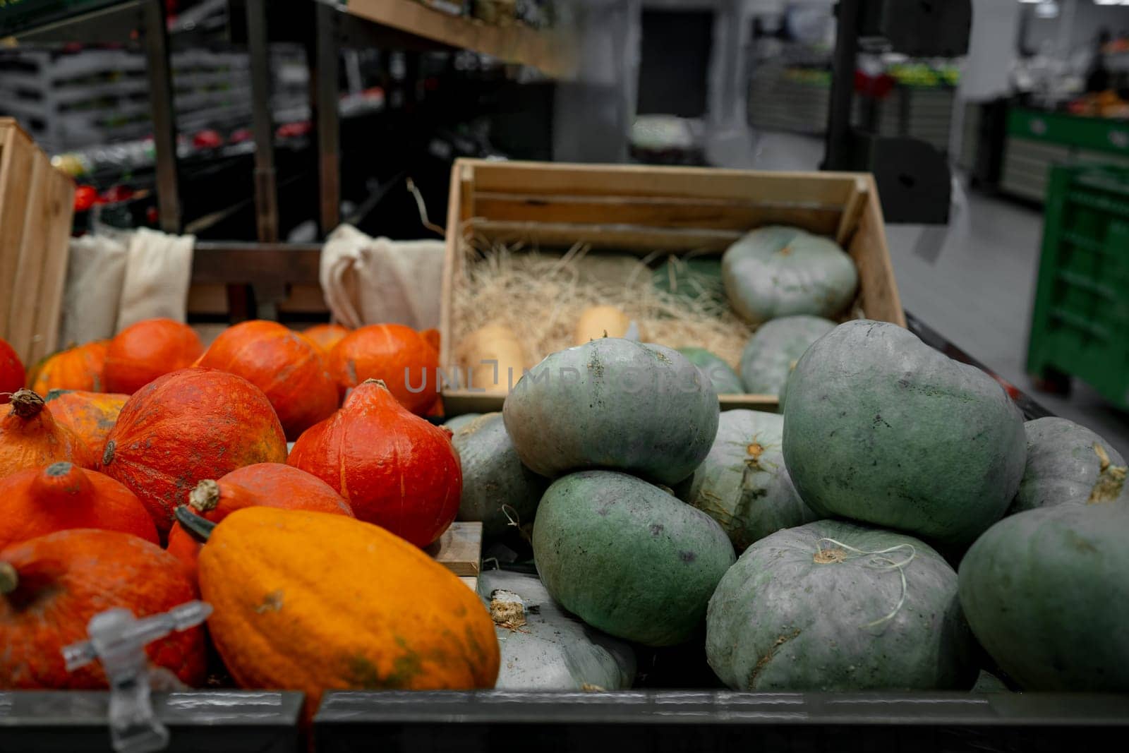 Supermarket Shelves Are Filled With Colorful Pumpkins