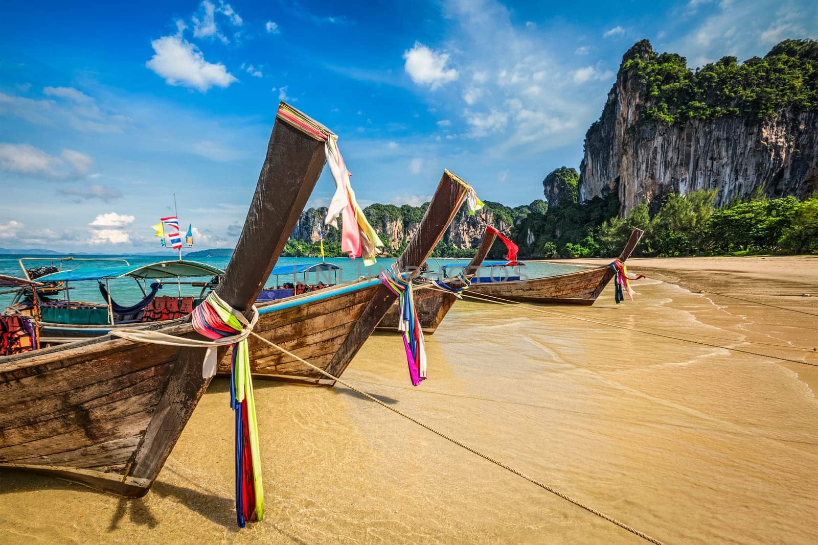 Long tail boats on beach, Thailand by dimol