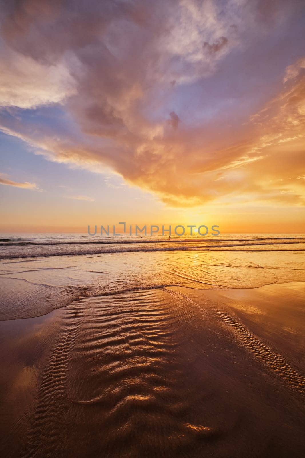 Atlantic ocean sunset with surging waves at Fonte da Telha beach, Portugal by dimol