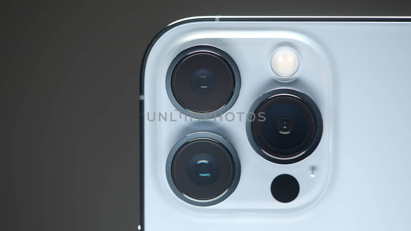 New iPhone. Action.New technology development concept with three cameras and new packaged box. Use for editorial only. High quality 4k footage