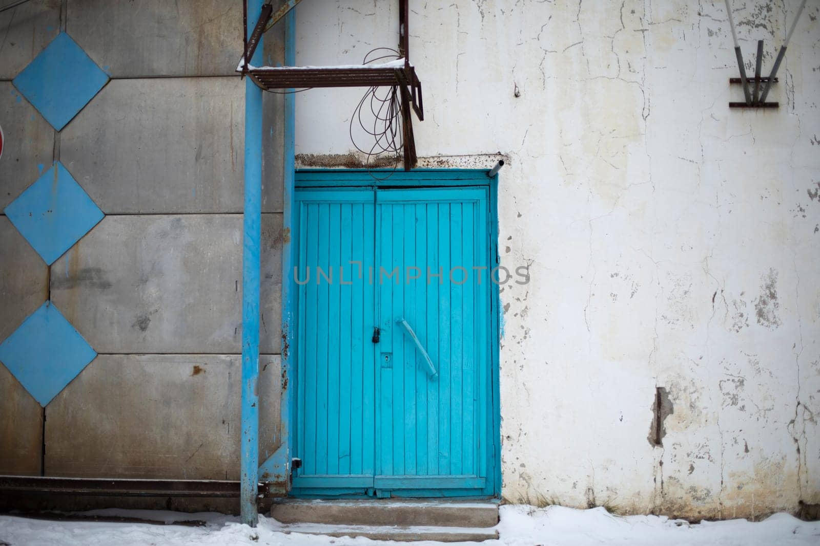 Blue door. Old door to building. Back entrance. Industrial purpose. by OlegKopyov