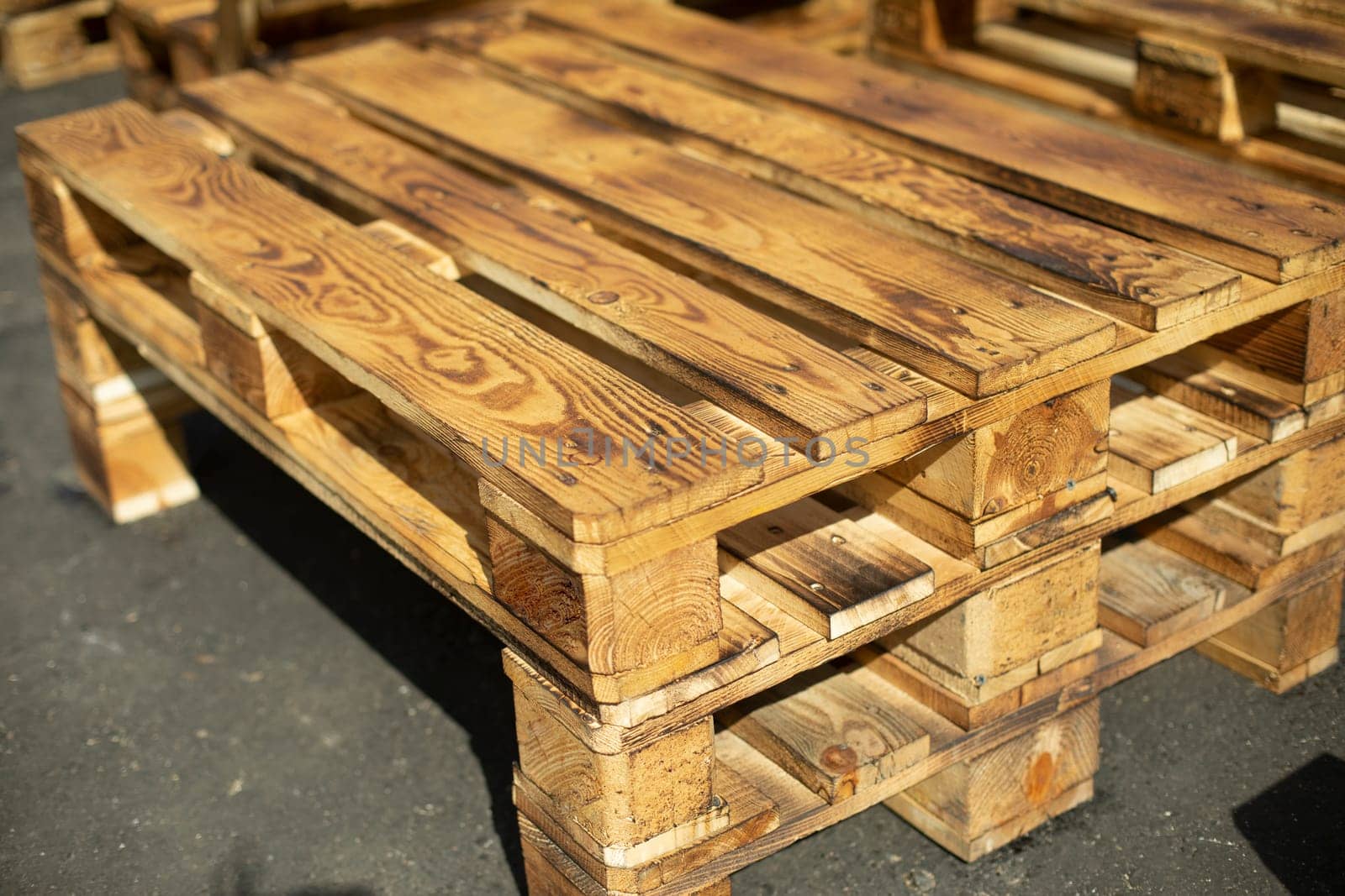 Furniture made of planks on street. Wooden pallets. Made of planks. by OlegKopyov