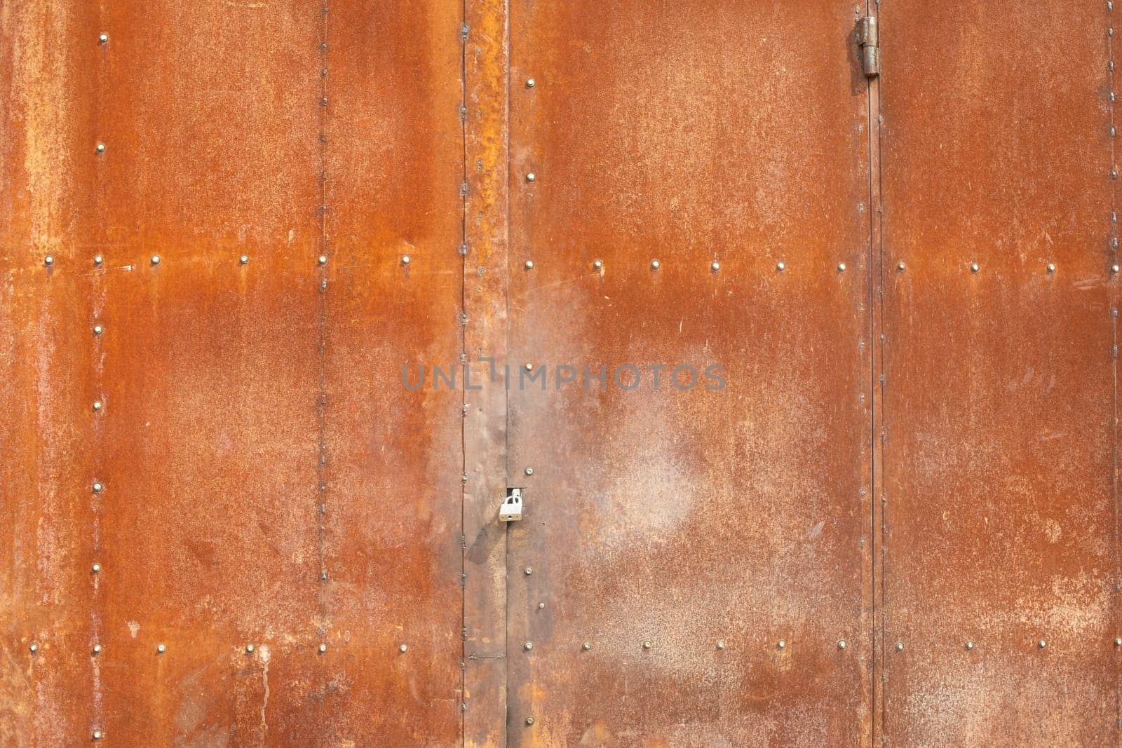 Rusty gates. Entrance to workshop. Industry in detail. by OlegKopyov