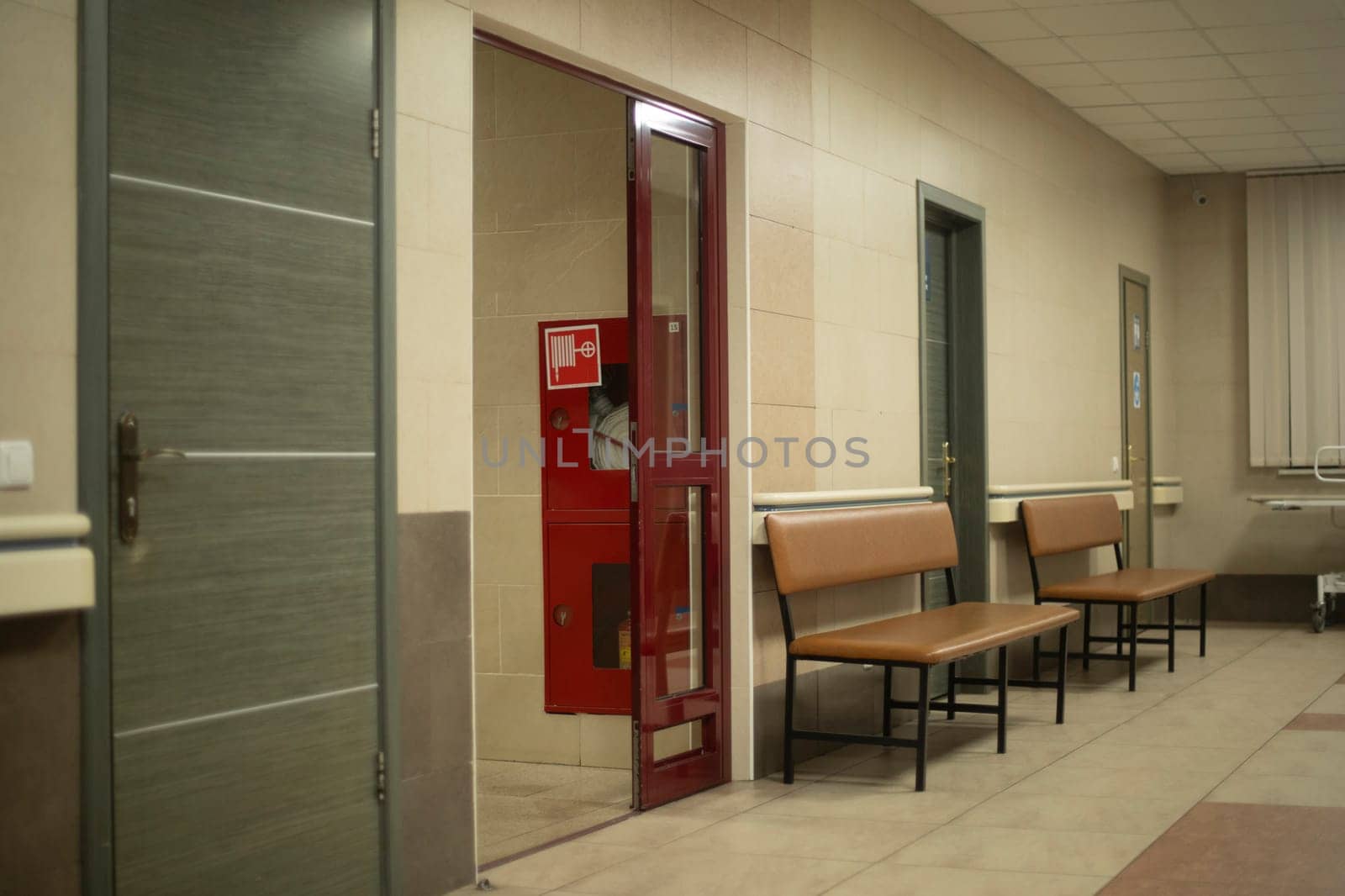 Indoor bench. The interior of the hospital. Empty corridor. Hospital Room Details. by OlegKopyov