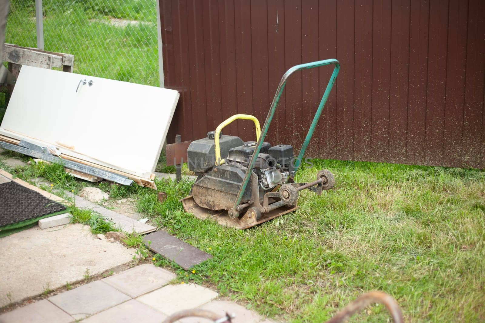 Track repair. Tool for repair on site. Ramming machine. Details of work.