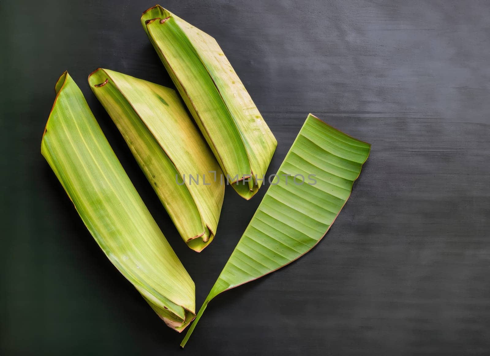 traditional of banana leaf on dark background with copy space. AI Generated. by PeaceYAY