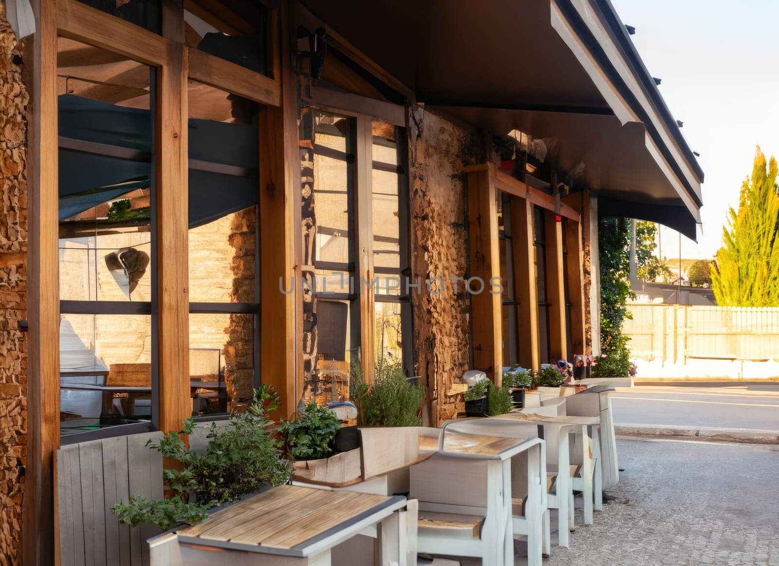 Exterior of small European wooden cafe or restaurant. with copy space.