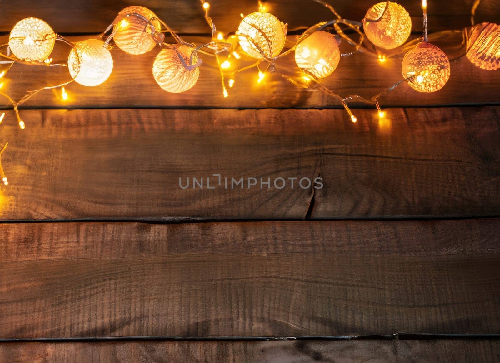 Beautiful christmas light on wooden background