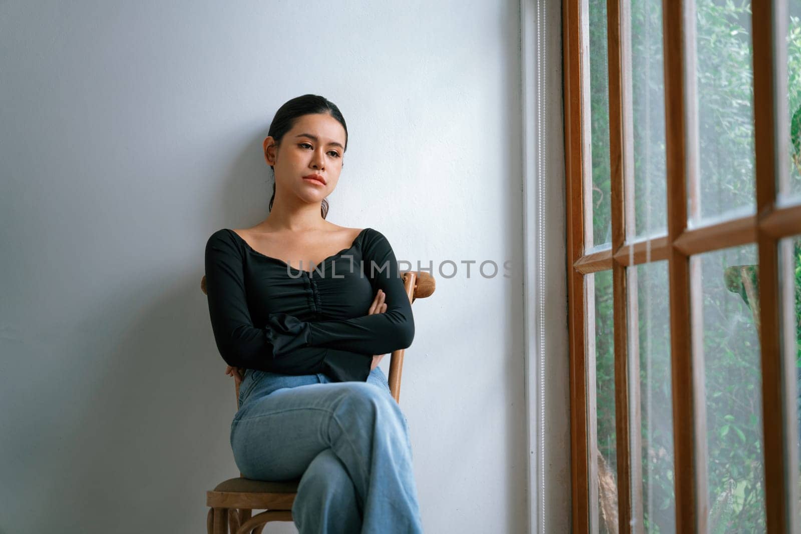 Depressed young Asian woman with mental health problem in mind need uttermost treatment from overthinking fatigue, disruptive thought, dissocial, anxiety and other mental health disorders .