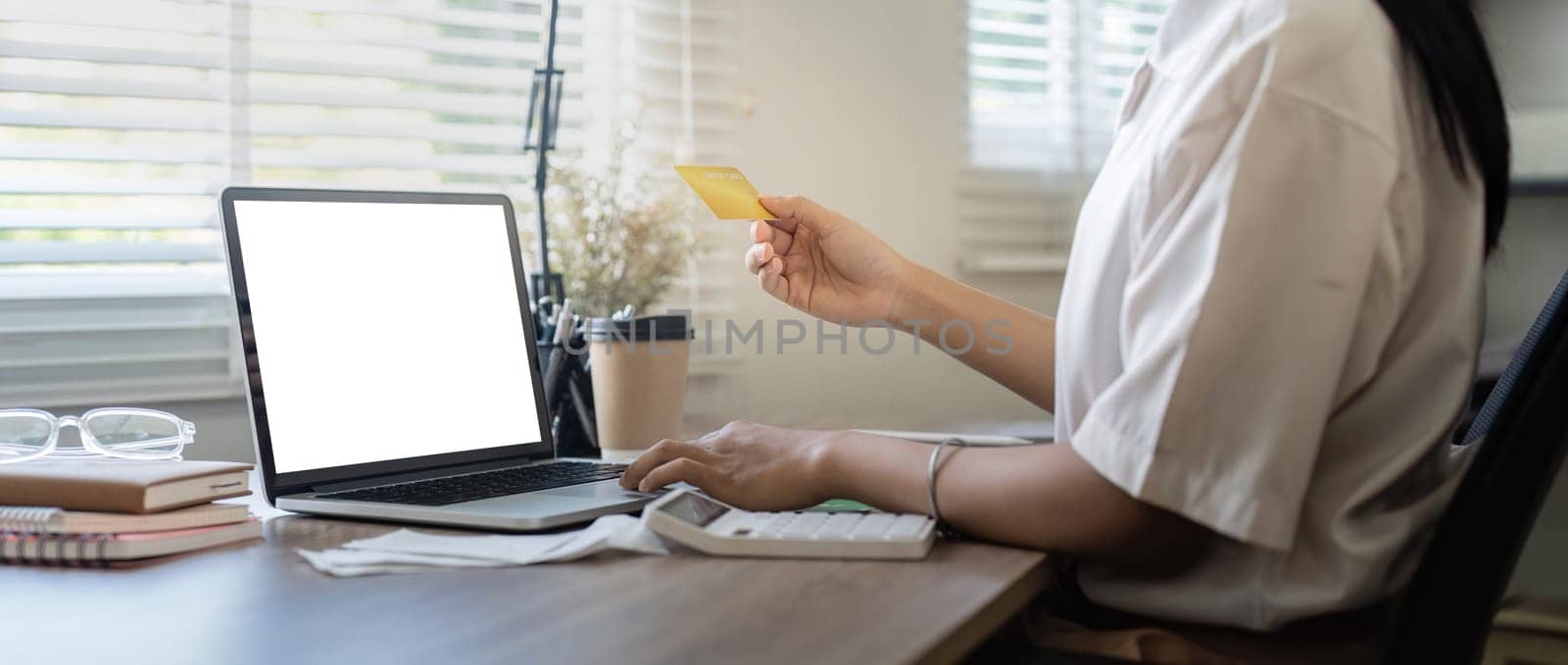 Credit card and laptop mockup for online payment, investment or savings insurance mock up. finance or woman on laptop blank screen.