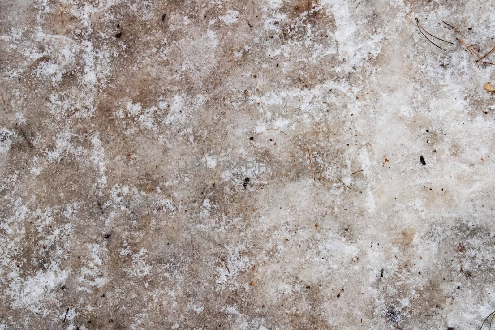 Gray ground under the ice, texture or background for text