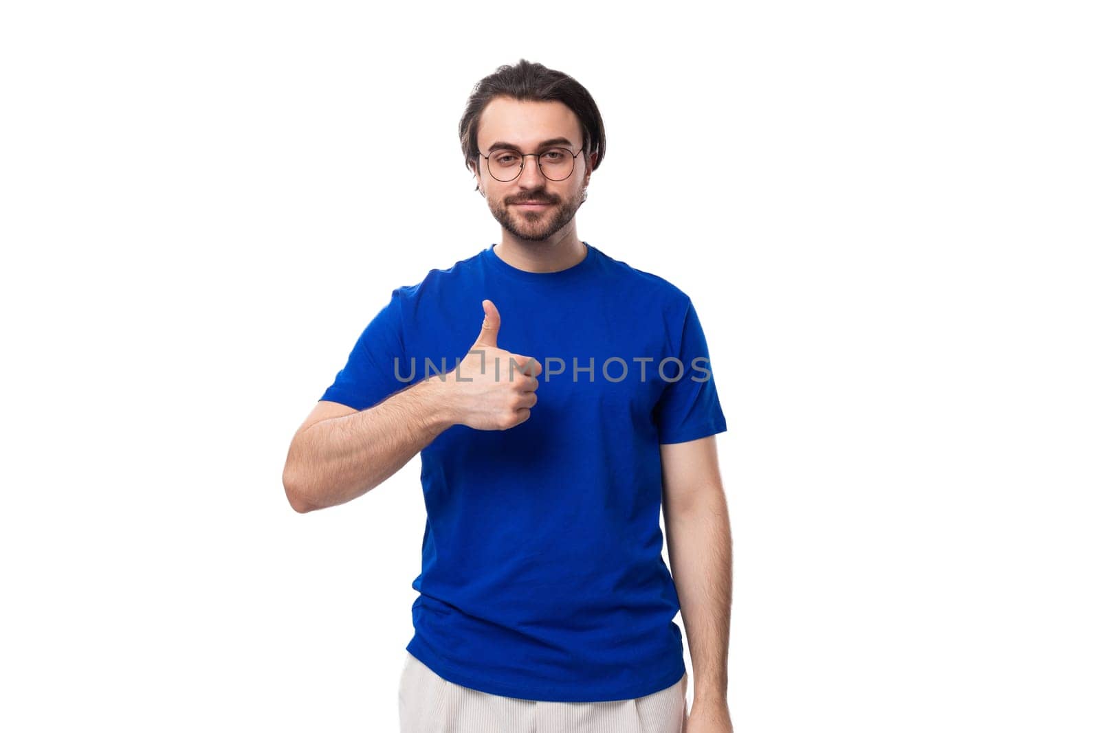 young handsome brunette man with beard in blue t-shirt with identity mockup by TRMK