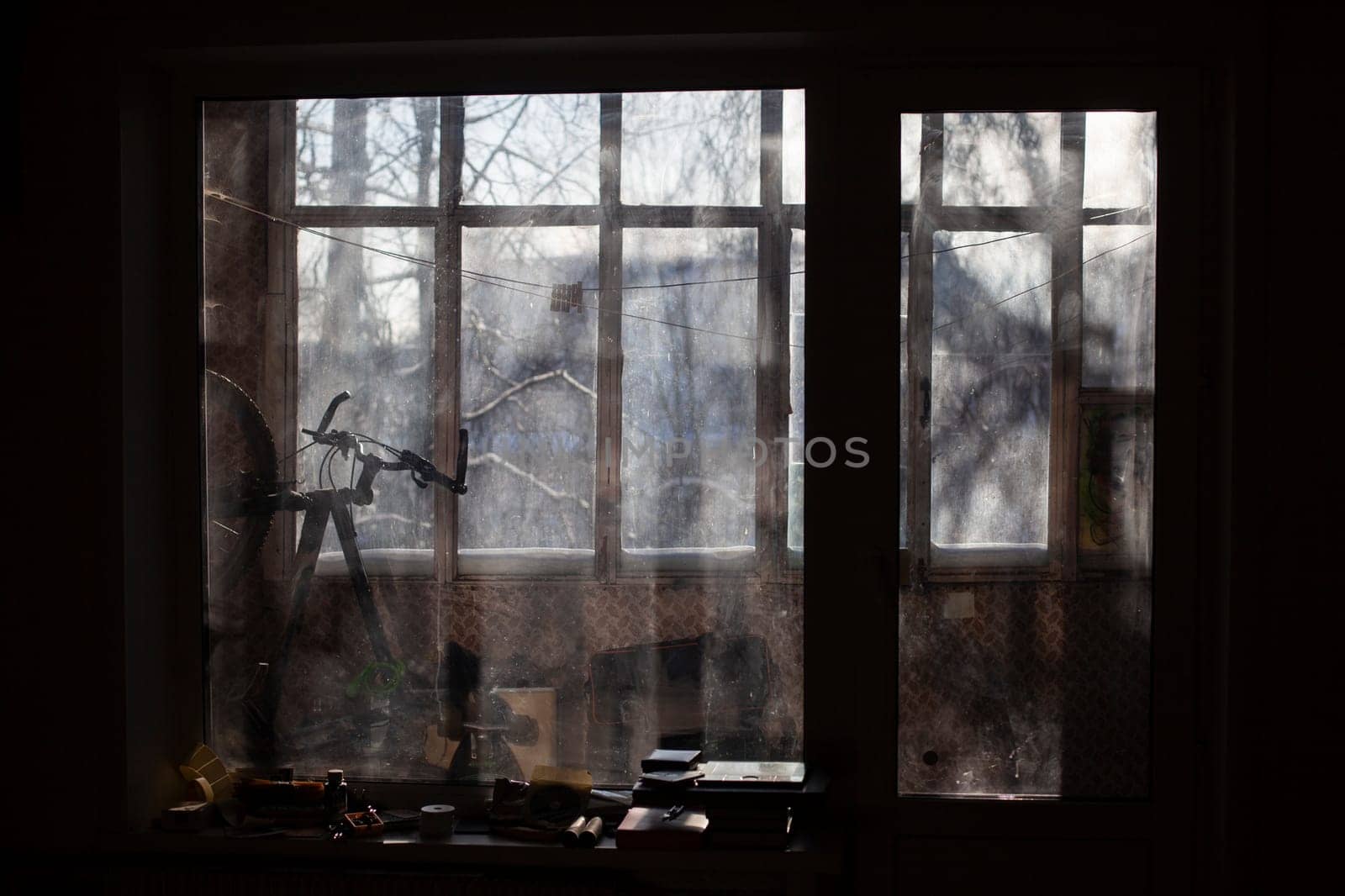 Window in morning. Interior details. View of window in dark. by OlegKopyov