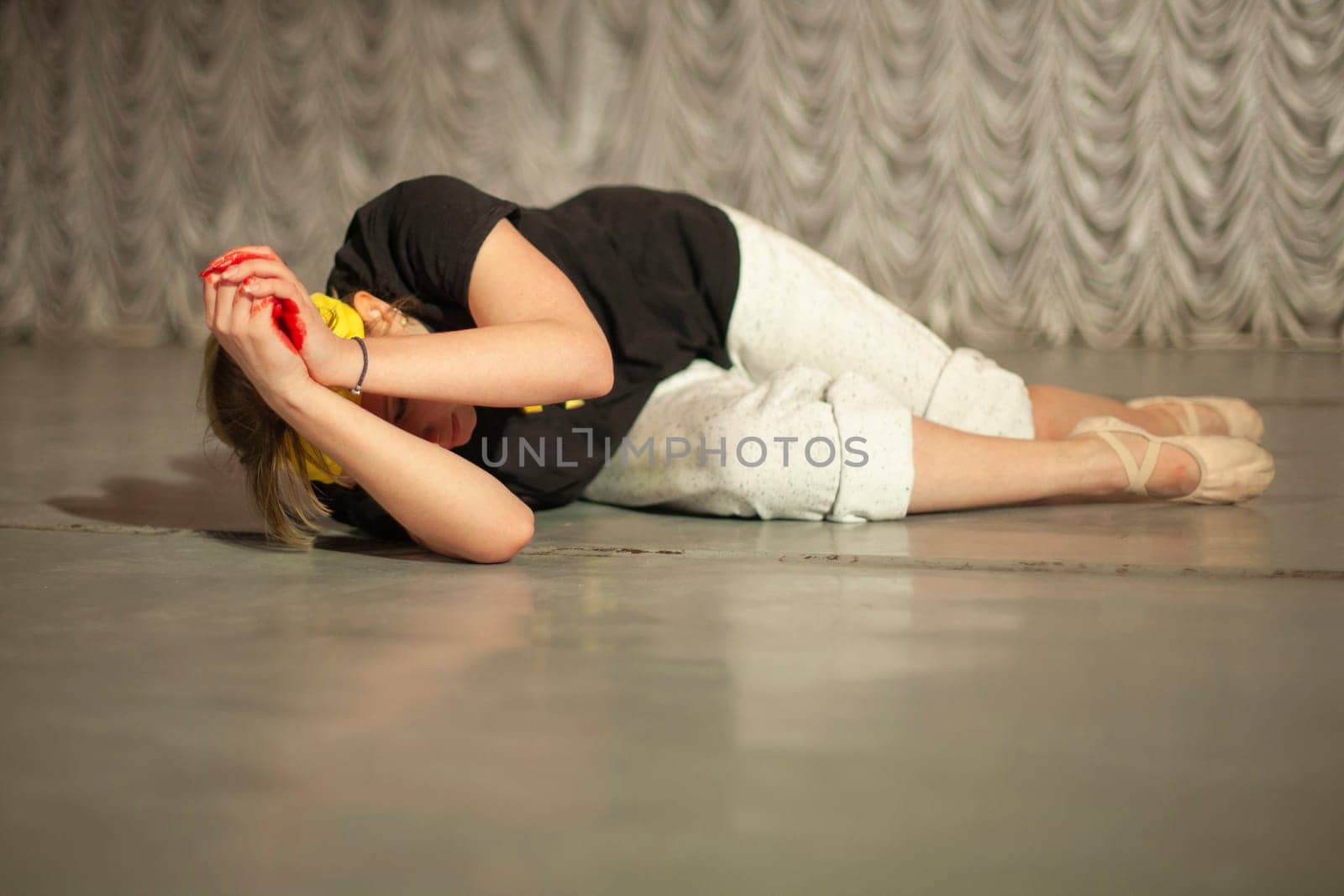 Girl shows emotions on stage. Dance teacher learns to express oneself in motion. by OlegKopyov