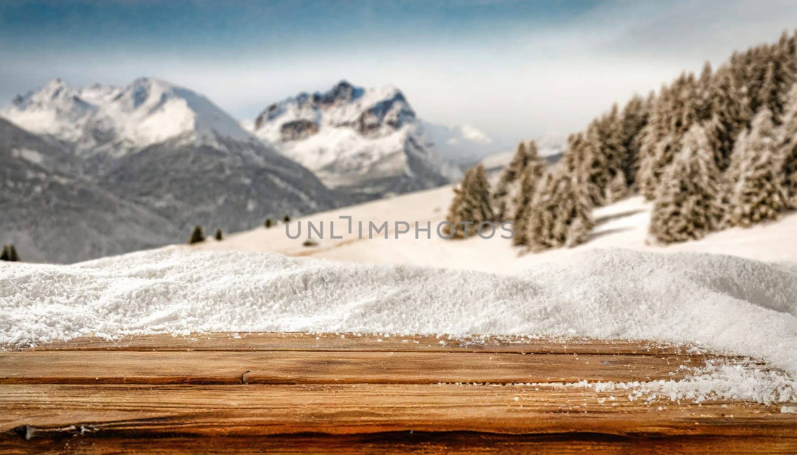 Wooden desk cover of snow and frost with christmas tree branch decoration.