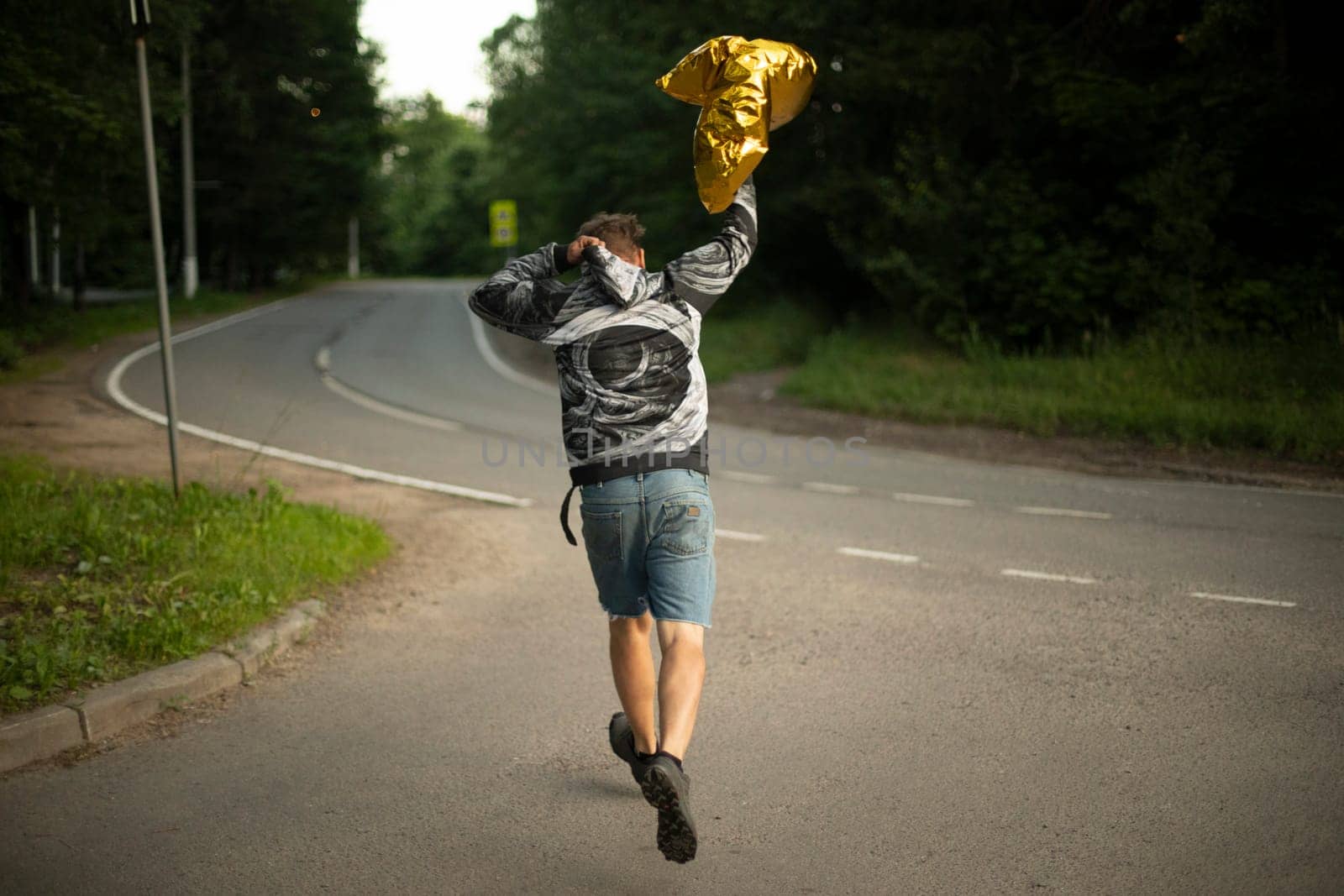 Guy with balloon. It's funny birthday. Man celebrates life. Funny guy.