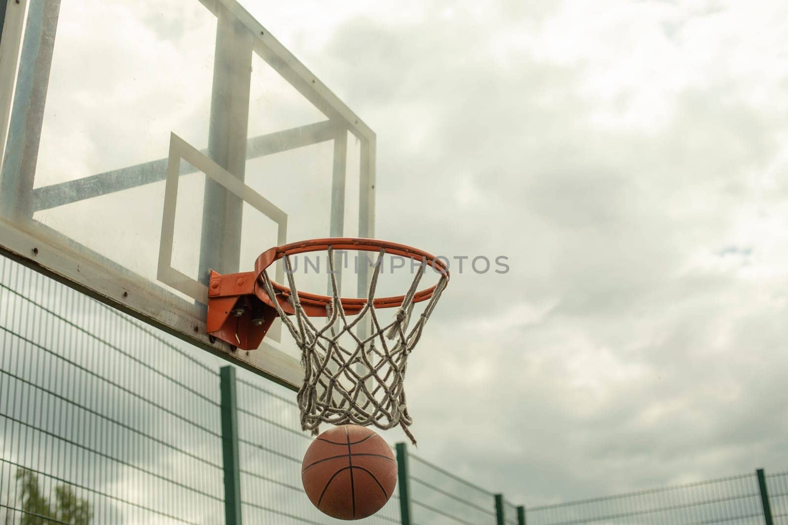 Throwing ball into basket. Accurate hit. Basketball. by OlegKopyov