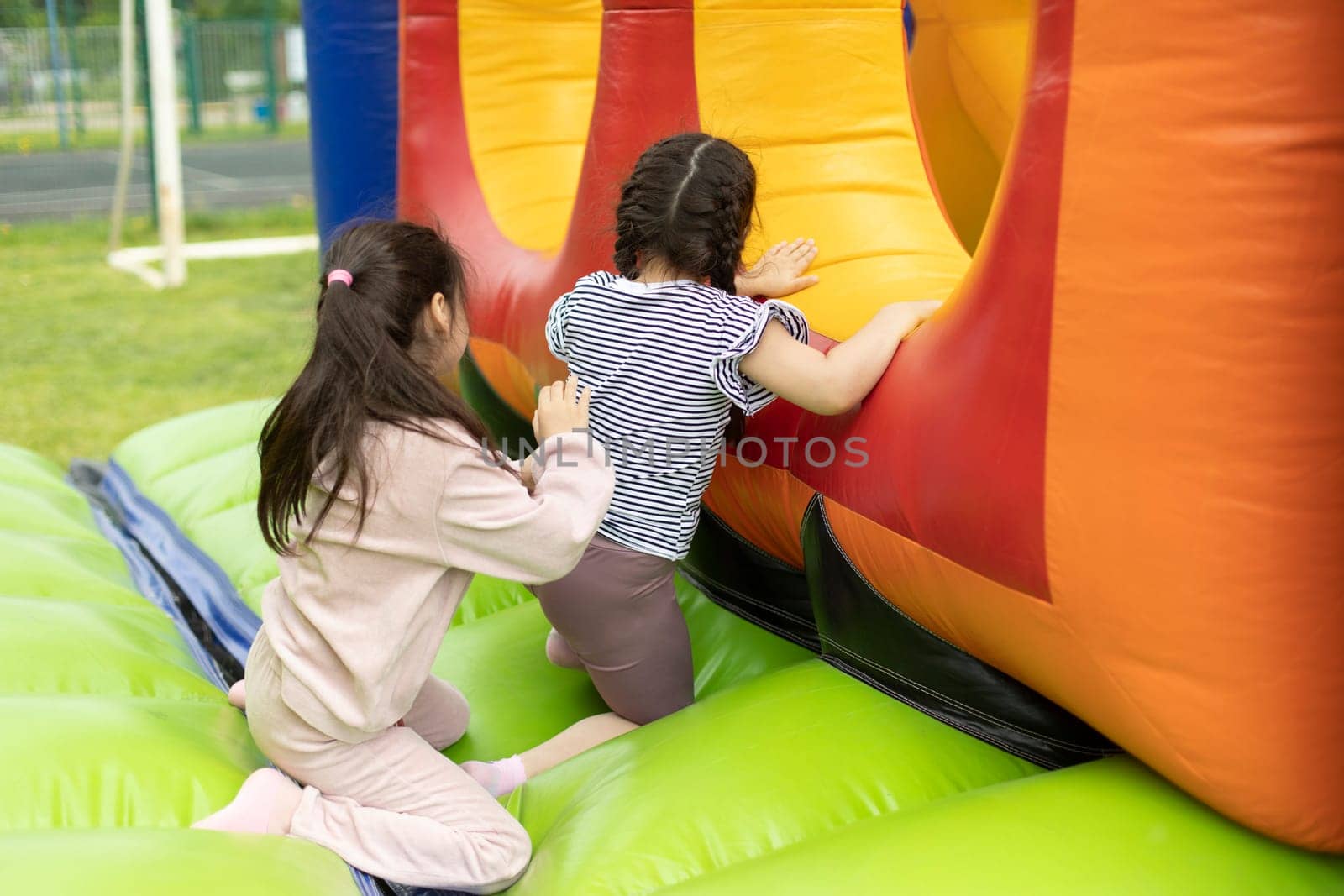 Child on obstacle course. Children's entertainment area. by OlegKopyov