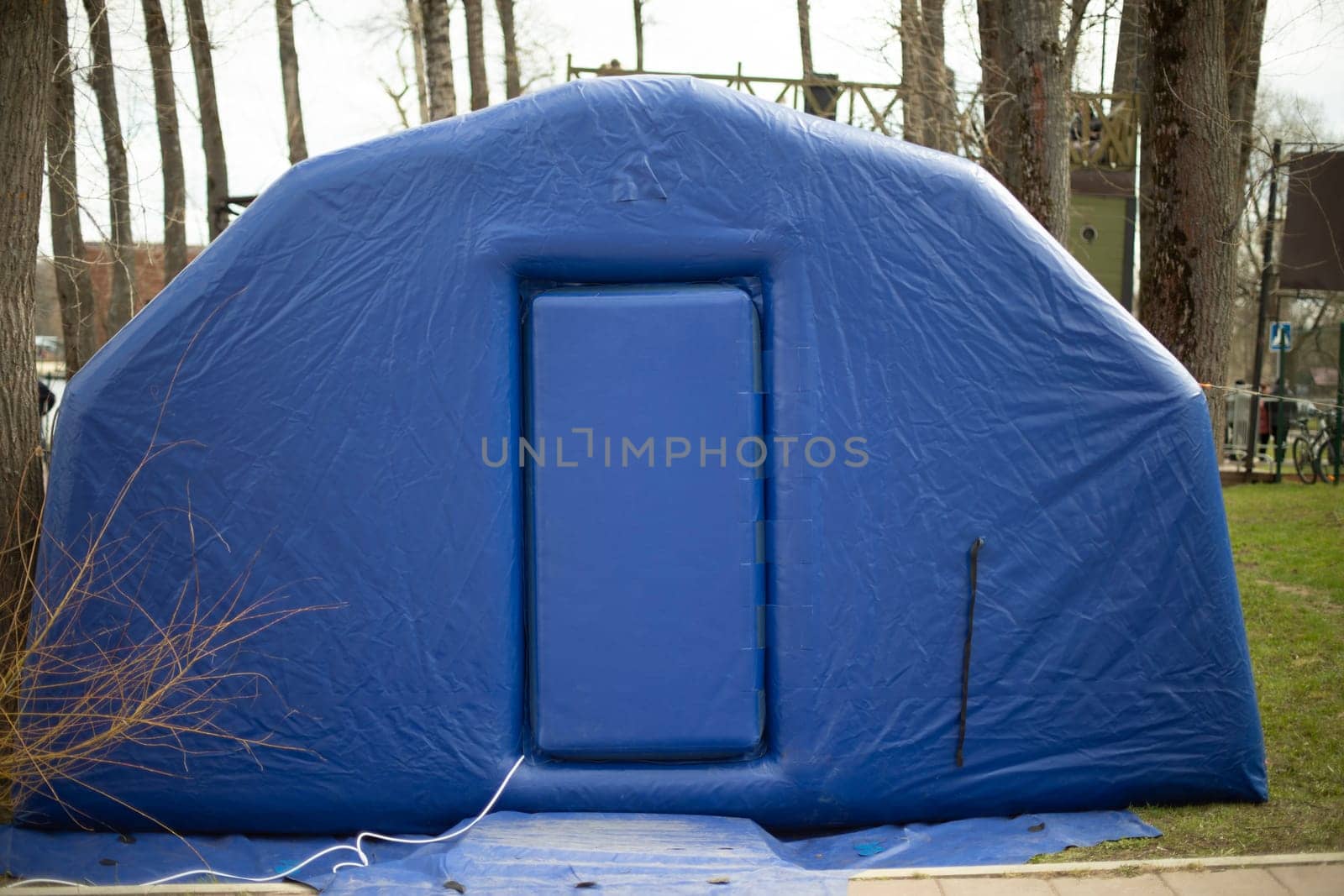 Blue portable sauna. Outdoor sauna. Inflatable room. Rubber construction.